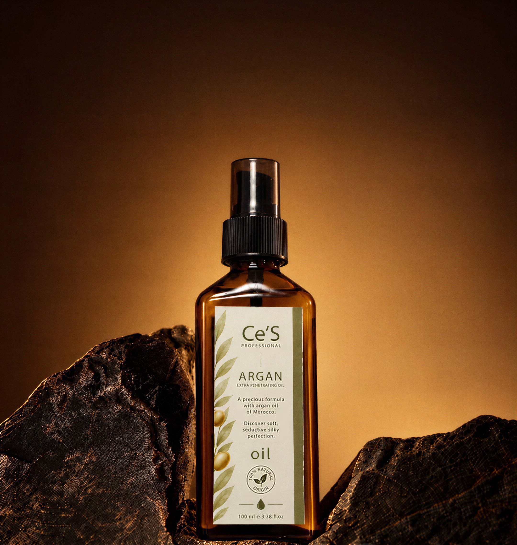 Ce'S Professional Argan Extra Penetrating Oil, 100 ml kehribar cam şişe, kayaların üzerinde